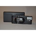 An Olympus XA Compact Rangefinder Camera, black, serial no 3611736, shutter working, condition G,