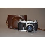 A Pentacon FM SLR Camera, serial no 187949, shutter working on higher speeds only, body G, with C