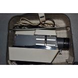 A Rollei P11.0 Medium Format Slide Projector, with a Vario-Heidosmat 110-160mm f/3.5 lens, slide