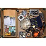 A Tray of Camera Accessories, including a box of assorted filters, lens hoods, cable releases, a