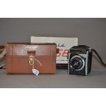 A Corfield 66 Roll Film SLR Camera, serial no AA009 18, shutter not working, body P, optics