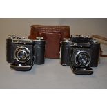 Two Certa Dollina 35mm Folding Cameras, a Dollina 0 with a Certar 5cm f/2.9 lens and Compur