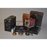 A Krugener Red Bellows Folding Camera, including a Krugener Delta Folding Camera with Rapid-Periscop