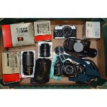 Canon SLR Cameras and Lenses, A Canon A1 camera, serial no 2380189, a Canon FTbN camera, serial no