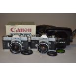 A Canon FT QL and a Canon FP SLR Cameras, FT, serial no 829216, with a Canon FL 50mm f/1.8 lens,