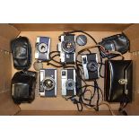 A Group of Olympus 35mm Cameras, a Range Finder EE camera, a Quickmatic EES 126 camera, a Pen EE