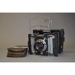 A Van Neck Folding Press Camera, condition P, with Ross Xpres 6" (152mm) f/4.5 lens, condition F,