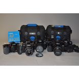 A Group of Minolta Dynax SLR Cameras, including a Dynax 7xi with an AF 28-105mm f/3.5-4.5 lens, a
