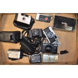 A Group of Compact Cameras, a Minox GT-E in maker's case, an Olympus Trip 35, a Mamiya U (2
