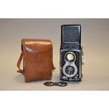 A Rolleiflex New Standard Roll Film TLR Camera, serial no 817099 with Tessar 7.5cm f/3.5 lens,