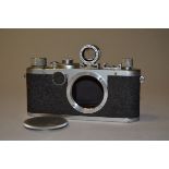 A Leica Ic Body, serial no 457151 (1949-50) with accessory 50mm viewfinder, shutter not working,