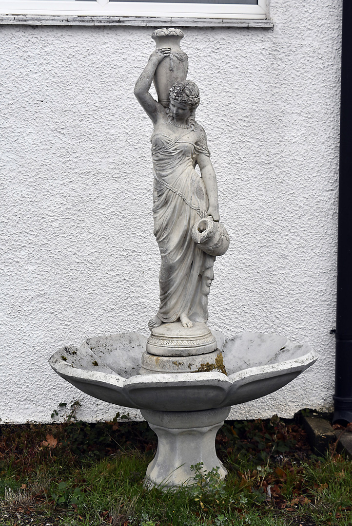 A stone garden fountain by Henri Studio Palatine, 'Rebecca at the Well', octofoil basin and base,