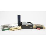 A pair of M.Hohner Echo Harps and a no.39 'Little Lady' miniature harmonica, a pocket telescope,