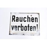 A WWII period German enamel sign, the rectangular convex sign having black border with black text '