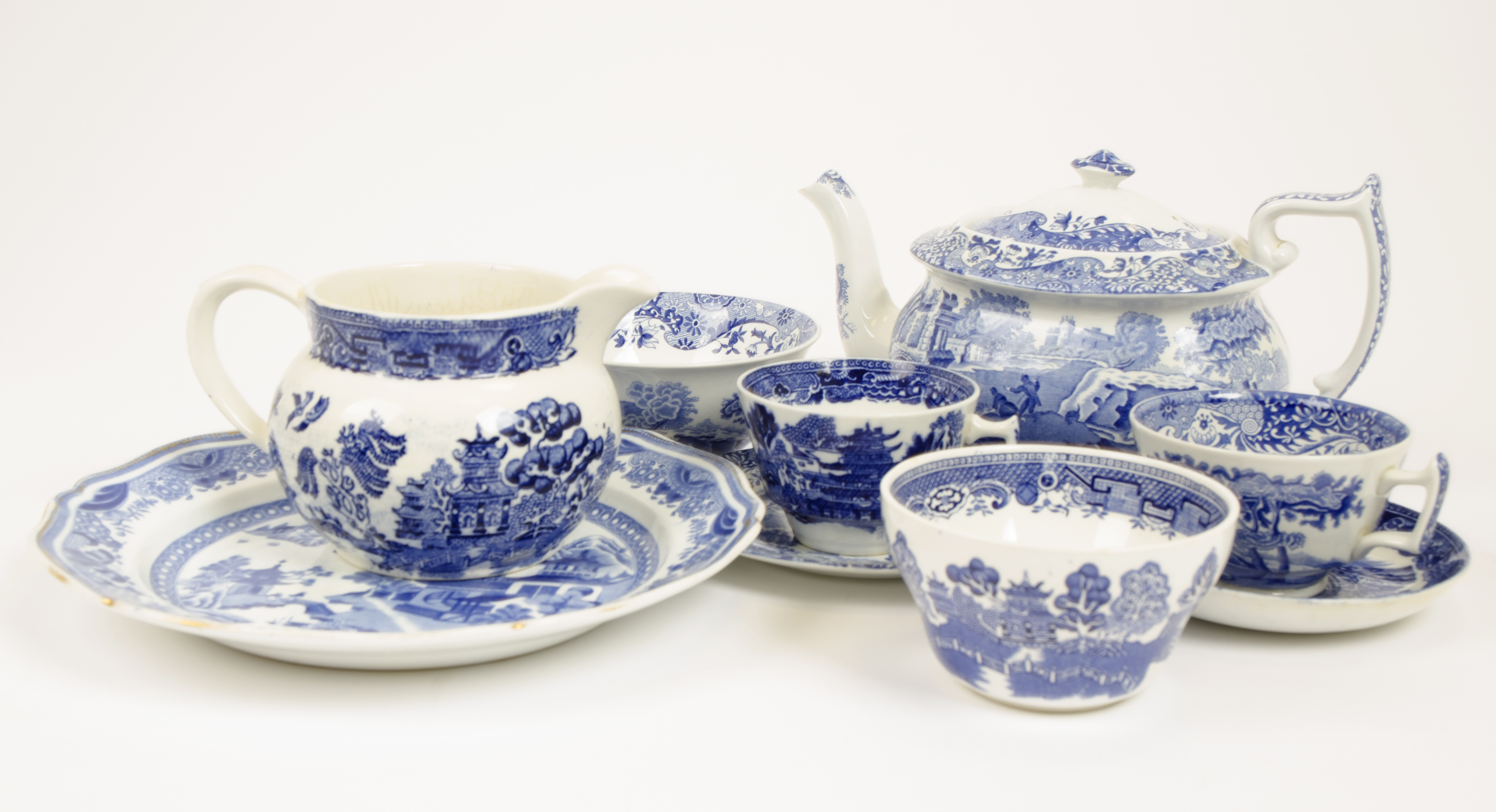 A collection of 19th Century Spode blue and white printed ceramics, seven teacups, nine saucers,