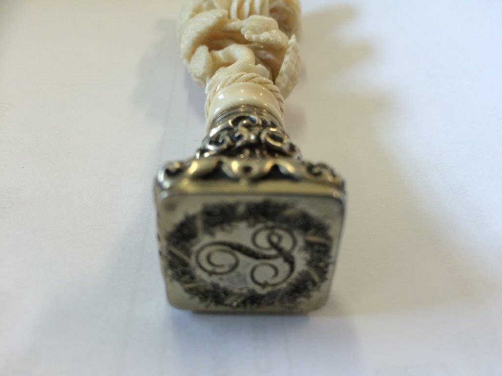 A 19th Century French carved ivory and silver desk seal, the handle carved as a bouquet of roses, - Image 6 of 7