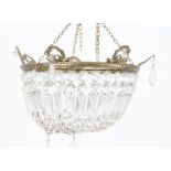 A cut glass and brass bag chandelier, faceted graduated drops (af), together with a gilt framed wall