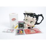 A large selection of Betty Boop collectables, including a Wade perfume bottle, mug, socks, whimsies,