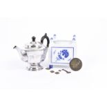 A 9ct gold chain, a quantity of costume jewellery and coins, a silver plated teapot, a continental