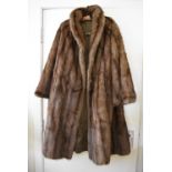 A 20th Century brown musguash fur coat,