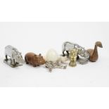 A miscellaneous collection, comprising treen, white metal and hardstone models of animals
