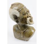 A large 20th Century African carved soapstone bust of a man with beard, 57 cm high