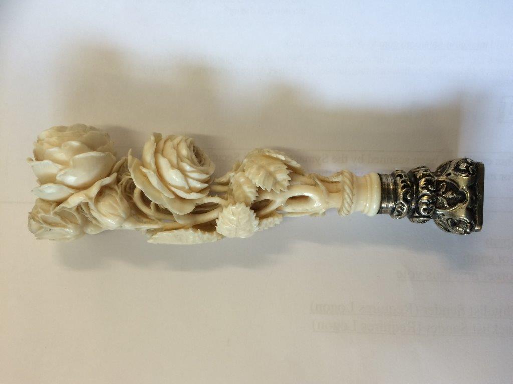 A 19th Century French carved ivory and silver desk seal, the handle carved as a bouquet of roses, - Image 2 of 7