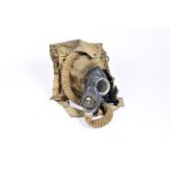 An RAF pilot's gas mask and carry case, 'Rich I.M, 111431044 R.A.F, together with two WWII