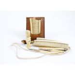 A miscellaneous collection of 19th and early 20th Century ivory bone and antler items, including