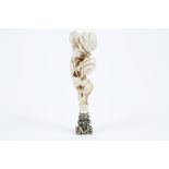 A 19th Century French carved ivory and silver desk seal, the handle carved as a bouquet of roses,