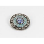 An early 20th Century silver and enamel brooch, shield shaped with Celtic motifs, Birmingham 1919 by