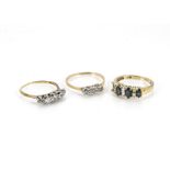 Three Art Deco and later 18ct gold and gem set rings, one a sapphire and diamond example, lacking