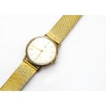 A 1960s Tudor 9ct gold cased presentation gentleman's wristwatch, 34mm case, satin dial, appears
