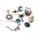 Two items of jewellery, including an Alpine scene enamel brooch in gold brooch or pendant mount, a