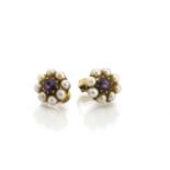 A pair of 9ct gold and seed pearl earrings, clusters centred with an amethyst and with clip backs,