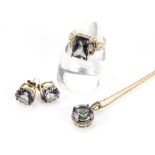 A modern gold and mystic topaz associated suite of jewellery, comprising a 10k marked dress ring,