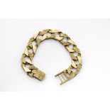 A 1980s 9ct gold gentleman's bracelet, having textured flattened links, hallmarked, 56g
