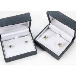 Two pairs of modern gem set stud earrings,