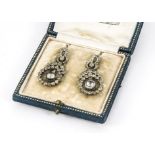 A pair of Edwardian paste set pendant earrings, presented in a W.Phillips box (3)