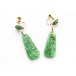 A pair of late 19th Century Chinese jade and gold panel drop earrings, carved with gourd and leaf