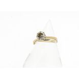 An 18ct gold diamond solitaire ring, brilliant cut circular diamond in eight claw white gold setting