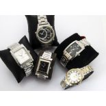 A group of five modern fashion watches, all boxed, including a Ben Sherman, Gucci, Storm, Pierre