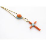 A 19th Century coral and enamel cross and heart pendant, the cross drop supported on a fine gold