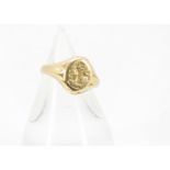 A 1980s 18ct gold signet ring, having intaglio rampant lion with dagger family crest, 6.4g and L
