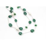 A modern silver emerald and pearl necklace