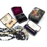 A collection of Victorian and later jewellery, including a French jet or black glass flappers