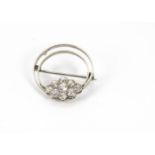 An Edwardian and later diamond brooch, the later 18ct white gold double hoop mount with a panel of