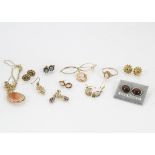 A collection of 9ct gold earrings, together with other yellow metal earrings and several items of
