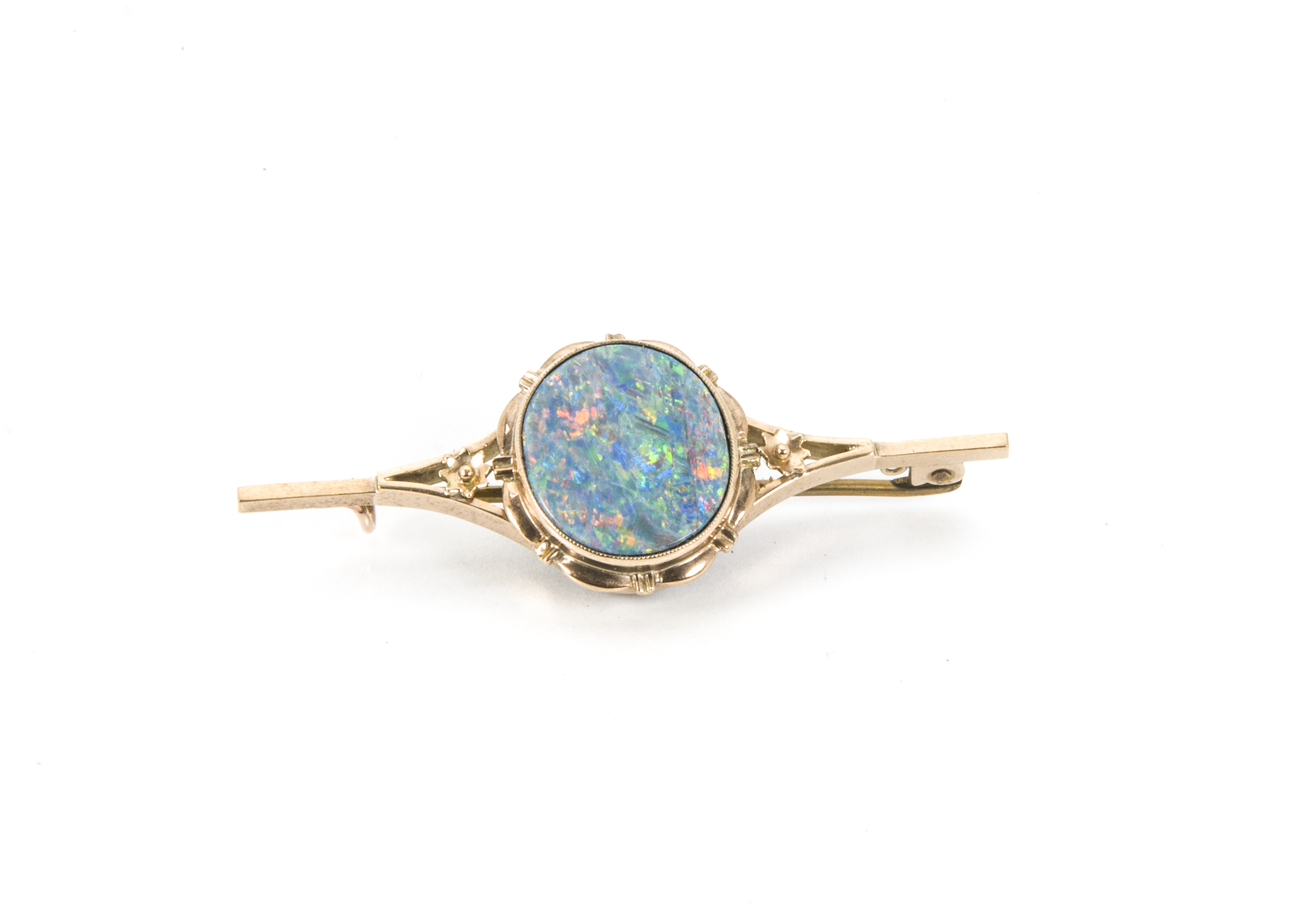 A vintage gold brooch, having oval simulated opal, base metal pin, 5.3cm