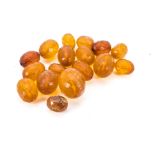 An unstrung Art Deco period Baltic amber bead necklace, faceted oval beads, largest 3cm (parcel)